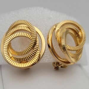 Circular Gold-Tone Clip Earrings Elegant Statement Accessory